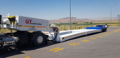 GT LOWBED SEMI TRAILERS which is knows also low loader and can carry heavy loads , excavators , construction machines, transformer, generator , cranes , caravans , army tanks and different kind of big machines. Lowbed Semi Trailers can be produced between 2 axles to 8 axles and loading capacity starting from 20 Tons to 180 Tons , rear or front loading Lowbed Trailers and platform as customer demand with different kind of specification according to demand. Self steering axles, hydraulic auto remote control axles, pool type chassis, Low bed Trailers hydraulic ramp, platform type chassis can be used in different kind of Low bed trailer