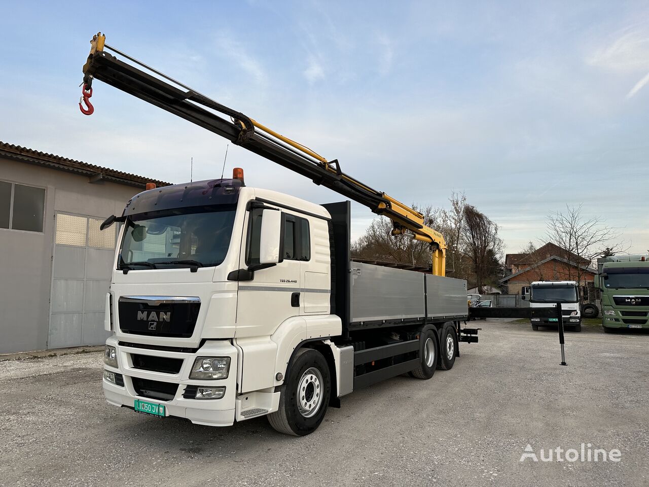 MAN Tgs 26440 flatbed truck