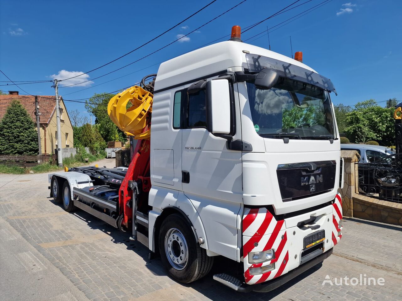 MAN TGX 26.440 hook lift truck